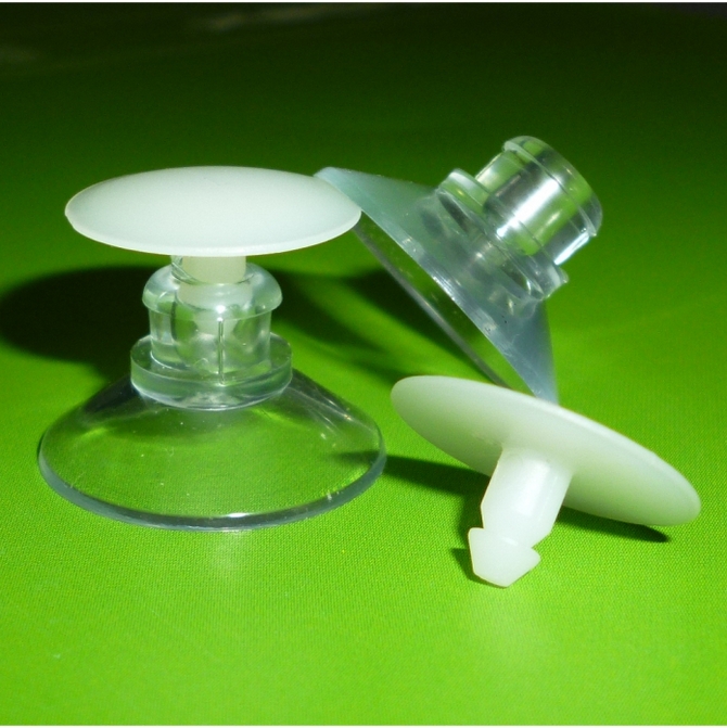 Suction cups with thumb tacks for posters. Suction Cups Direct.