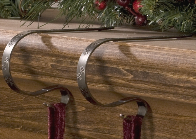 Haute Decor Christmas stocking hangers for fireplace mantels.