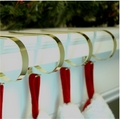 Haute Decor Stocking Hangers. Shiny Gold Finish. 4 pack.